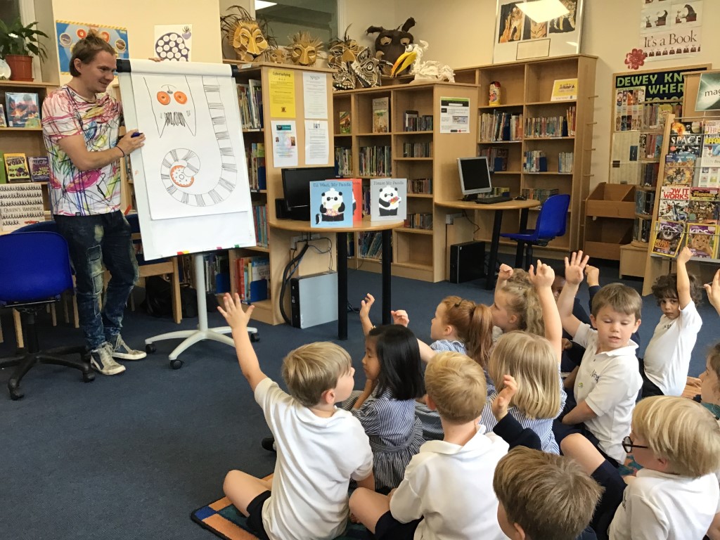 Author Steve Antony drawing a lemur for Reception children